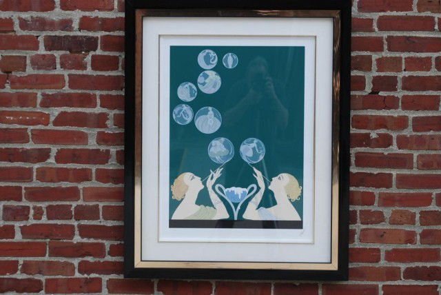 ERTE' "BUBBLES" SERIGRAPH: Two women blowing bubbles 27-1/2"H x 20-1/2"W Signed Erte' Numbered 155/300 Black lacquer frame In good condition.