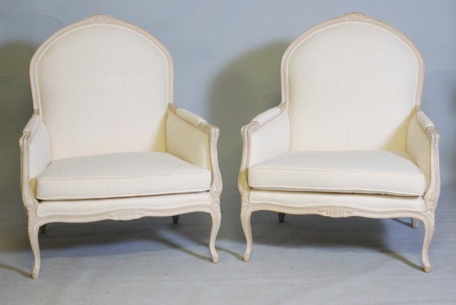 PR. OF LOUIS XV STYLE BERGERES: Extra large size, Beechwood frames with scrubbed whitewash finish, white muslin upholstery, 34"W x 41-1/2"H x 28-1/2"D. In good condition.
