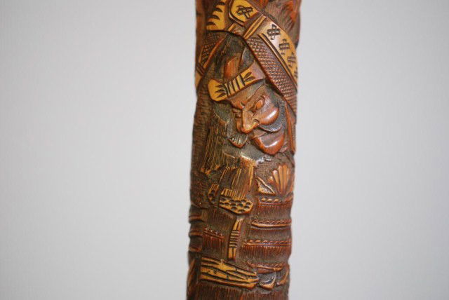 ANTIQUE ASIAN WALKING STICK: Caned wood, 36"h. In good condition.