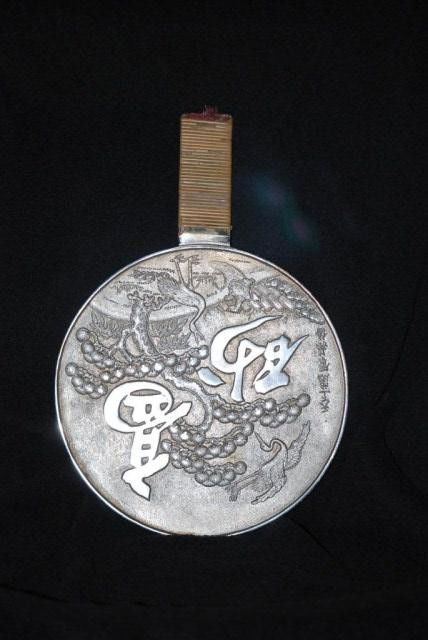 ANTIQUE ASIAN S.P. HANDLED MIRROR: Silver plated in a fitted case, 12"h x 8"w. In good condition.