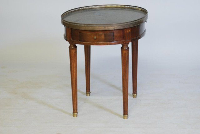 LOUIS XVI STYLE M.T. BOUILLOTTE TABLE: Mahogany 1-drawer table with pullout slides, topped with a green marble brass galleried top, 25"h x 23"w x 25"d. In good condition.