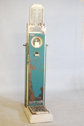 "SKYSCRAPER" INTERNATIONAL TICKET SCALE: Model "S", 77"h x 15 1/2"w x 25"d. In original "as found" condition with paint loss.
