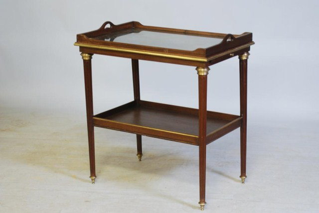 JANSEN STYLE DESSERT TABLE: Mahogany with distressed mirror insert lift-off tray and bronze mounts, 33"h x 29"w x 21"d. In good "as found" condition.