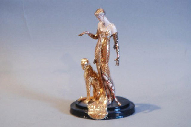 HOUSE OF ERTE PORCELAIN STATUE "OCELOT": 8 1/4:h x 5"w x 4"d. In good condition.