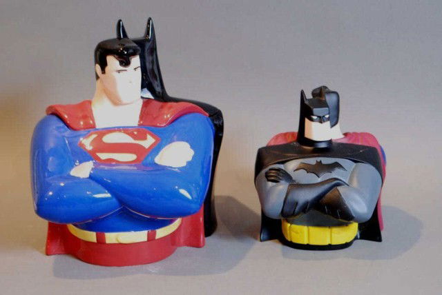 2-PC. LOT SUPERMAN AND BATMAN: 1-Ceramic Cookie Jar, Warner Bros. Studio Store, 12"h x 10"w x 12"d, 1-Plastic Bank, 9"h x 7"w x 9"d. Both in good condition.