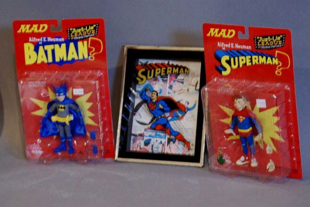3-SUPERMAN, BATMAN, ALFRED E. NEUMAN ITEMS: 1-Superman Alfred E. Neuman toy, 1-Batman Alfred E. Neuman toy, 1-Superman three-dimensional framed art work. All in good condition.