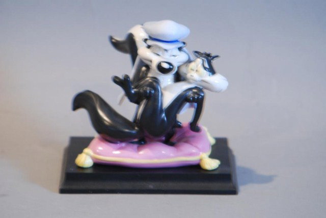 LOONEY TUNES GOEBEL COLLECTION "ZIE BROKEN HEART": Spotlight Collection scene from the 1952 "Short Little Beau Pepe, certificate of authenticity, film cell and other original paperwork, statue measures 5-1/2"h x 5"w x 5-1/4"d, comes with a black base,