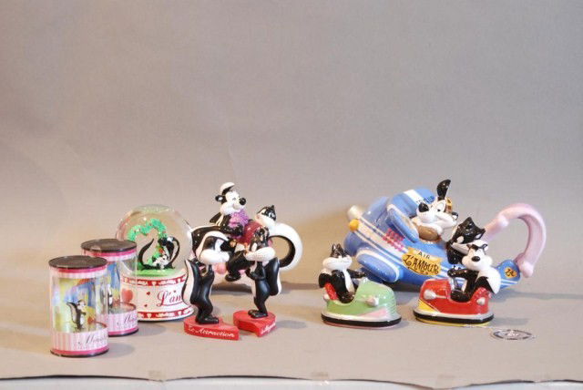 8-PC. PEPE LE PEW AND PENELOPE COLLECTIBLES LOT: 1-Tea Pot, 1-Airplane Jar, 1-Pr. Salt and Pepper bumper cars, 1-Miniature Pepe, 1-Miniature Penelope,1-Broken Heart (all with Warner Bros. Studio), and 1-Lamour Goebel windup. All in good condition.