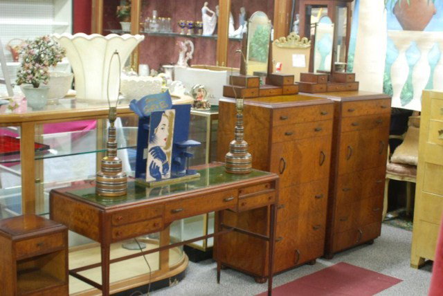 4 PC. ART DECO STYLE BEDROOM SET: Unusual pair of chests with attached mirrors, dressing table (no mirror) and night table. Walnut with bake-lite insert tops. In good "as found" condition.