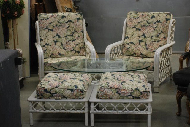 5 PC. FICKS REED SET: Two arm chairs, two ottomans and a glass top table. Needs some new straps.