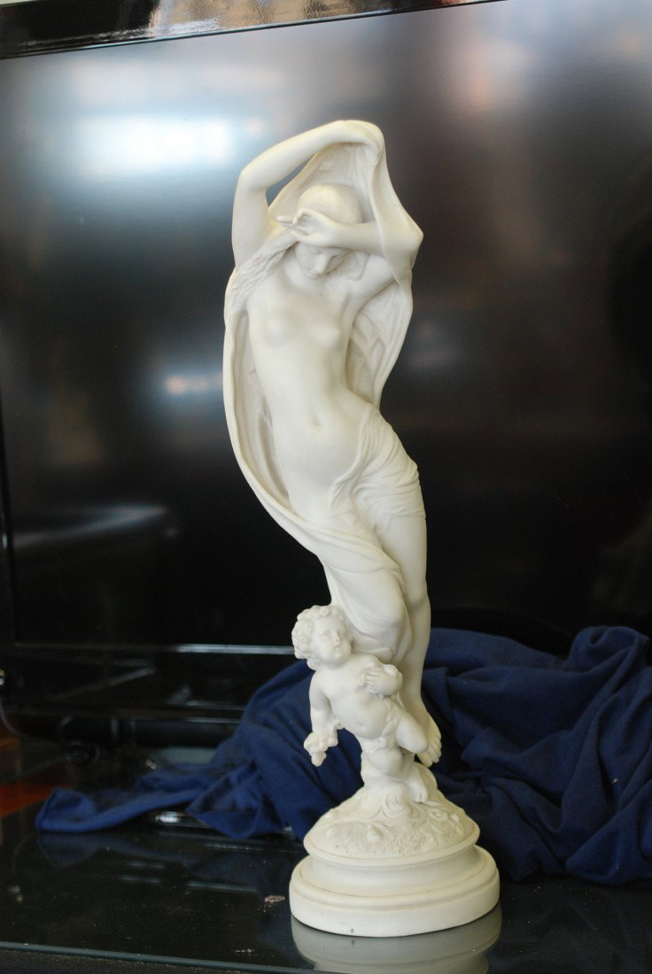 PARIAN STATUE OF A WOMAN: Old repairs. 21 1/2" H X 5 1/2" W W 6 1/2" D.