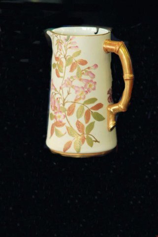 ROYAL WORCESTER PITCHER: Rare pitcher lacking original lid.7"H X 5"W X 4"D . In good condition.