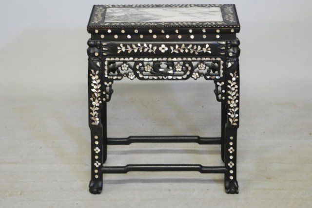 ANTIQUE CHINESE M.O.P. INLAID HARDWOOD TABLE: Hardwood Table with mother of pearl inlays and inset marble top, 24"H X 20"W X 12"D. In good condition.