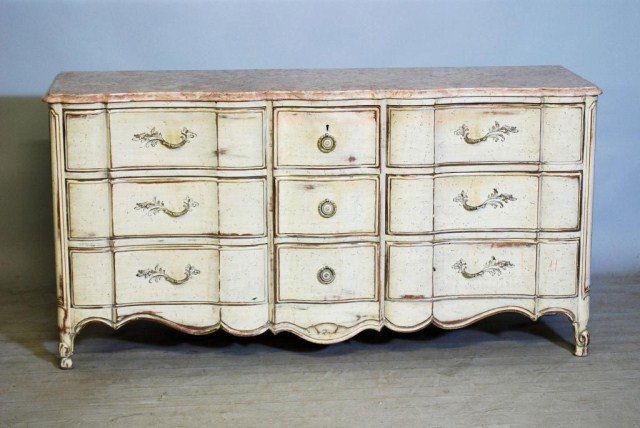 LOUIS XV STYLE MARBLE TOP COMMODE: Custom made solid walnut Commode with distressed paint finish, marble top, wallpaper lined interior, bearing the label "Casaragi", 123 E. 65th Street, N.Y.C. 21, and numbered 1535, 34"H X 66"W X 20 1/