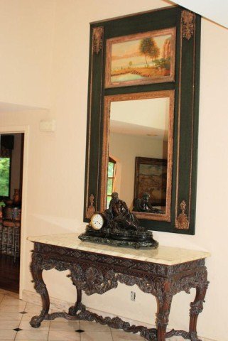 LARGE LOUIS XV STYLE TRUMEAU: Monumental mirror with paint decorated top panel. In good condition.