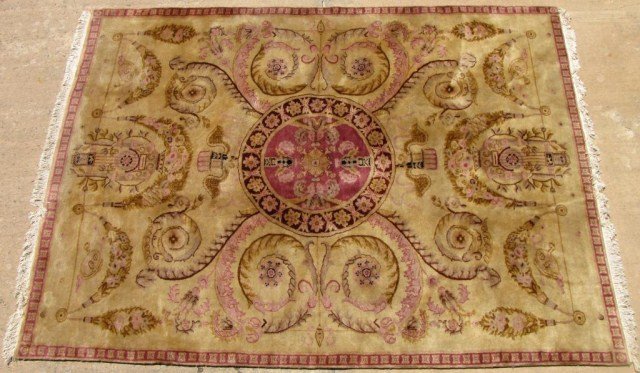 AUBUSSON STYLE LOUIS XVI DESIGN RUG: Flowing French curves, stylized swags of floral foliage create a pleasant and soothing design to the eye, complemented by the reserved tones and hues of the entire rug, 97" X 132". Ready for immediate