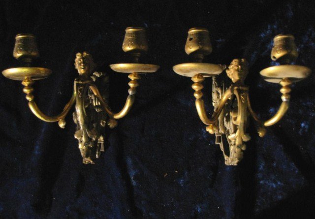 PAIR ELEGANT BRONZE PORTRAIT SCONCES: Detailed faces of lovely, young, Victorian, women grace the centers of these attractive, cast bronze sconces, 7"D X 9"W X 8"H. A couple of repairs are discernible.