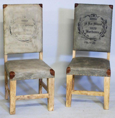 PAIR OF "BORDEAUX" CHAIRS: Chairs with distressed wood frames, canvas upholstery with stenciling "B La Blan 1829 Bordeaux No.23, leather corners and brass upholstery tacks, 42"H X 18 1/4"W X 19"D. In good condition.