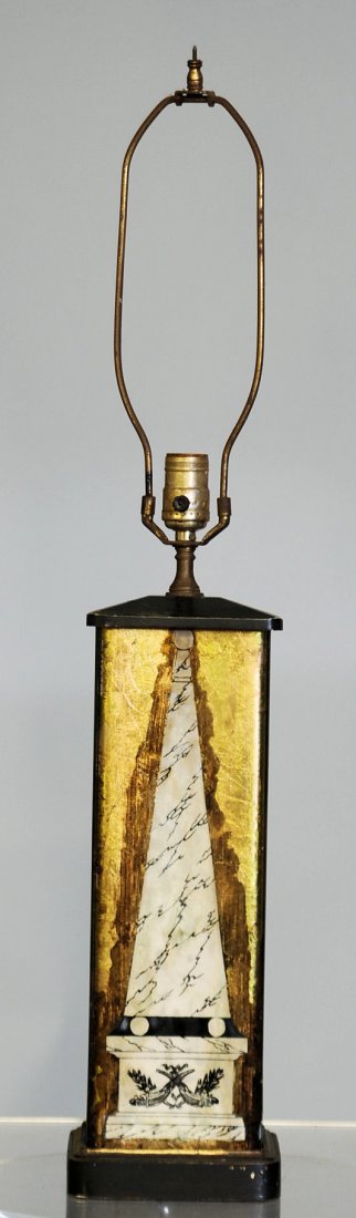 PIERO FORNASETTI LAMP: Reverse paint obelisk Lamp on a square, glass column, black wood base and cap, 33"H X 6"W X 6"D. In good "as found" condition.
