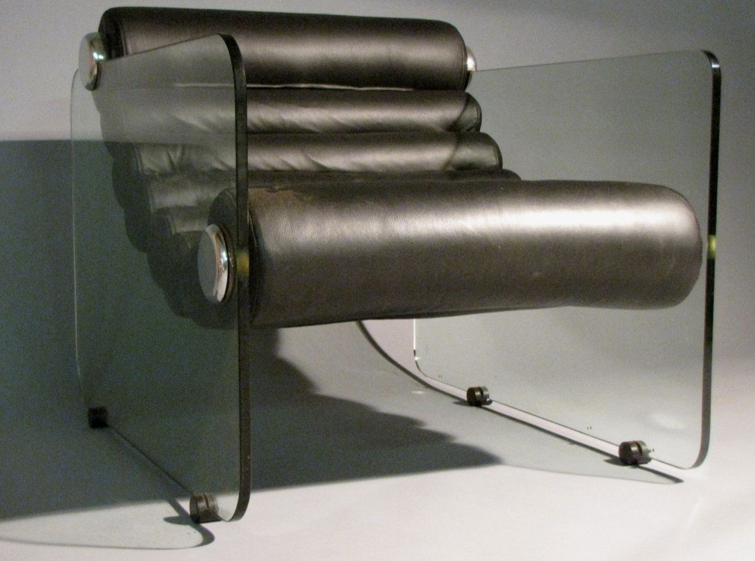 FABIO LENCI ADJUSTABLE MODERN LOUNGE CHAIR: Chair with glass sides and rolled black leather adjustable sling seat, 28 1/2"H X 29 1/2"W X 35 1/2". In good condition: tight, solid & ready for immediate installation.