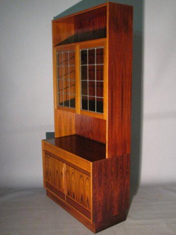 2PC.ROSEWOOD DANISH MODERN SECRETARY: Twenty four panes of leaded golden amber glass, top is removable, 74" X 35"W X 17"D. Only the most negligible natural sear. A beautifully well-assembled piece ready for an appreciative new home