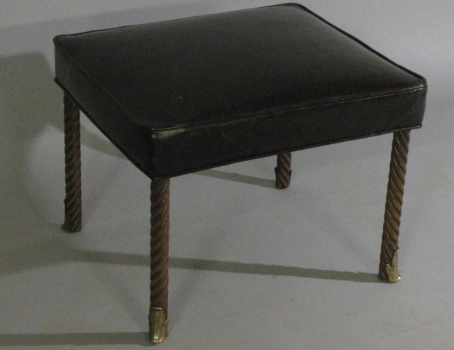 JAMES MONT DESIGN BLACK HASSOCK STOOL: Barley twist leather stool with brass appliques. A quintessential Mont design. Mont is known for effectively speaking two aesthetic languages, simultaneously. A perfect period accessory item for the d