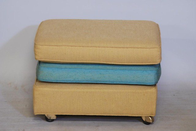 MID CENTURY MODERN DUNBAR STYLE FOOTSTOOL: Vintage Footstool, gold and teal upholstered 3-cushion ottoman, possibly made by Dunbar Furniture Company, 17"H X 25 1/2"W X 21 1/2"D. In good "as found" condition.