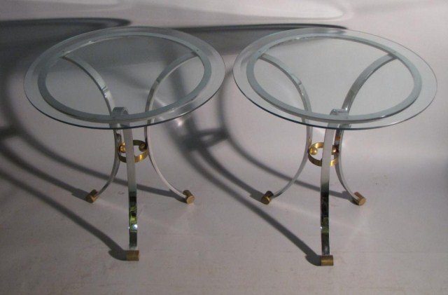 PAIR TRI-LEG MAISON JANSEN CHROME TABLES: Chrome with brass accents with glass tops. Removed from the Waldorf Astoria Hotel, 26" X 27"H. In good "as found" condition.