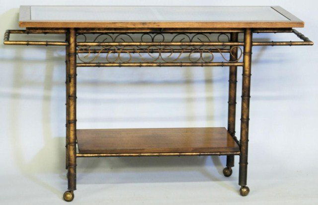 MID CENTURY MODERN SERVING CART: Faux bamboo metal frame Cart, oak frame glass top, caning underneath top, oak bottom shelf and 4-wheels, 32 3/4"H X 54"W X 20 3/4"D. In good condition.