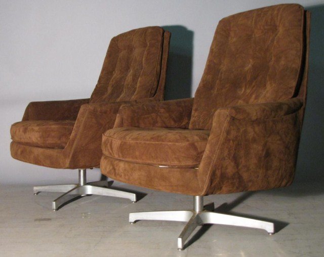 PAIR OF WOODMARK MODERN PLUSH LOUNGE CHAIRS: Clean polished aluminum bases, soft and comfortable fabric and padding, 31"W X 32"D X 39"H, seat height 18". Only the lightest natural toning, very clean and ready for immediate installation.