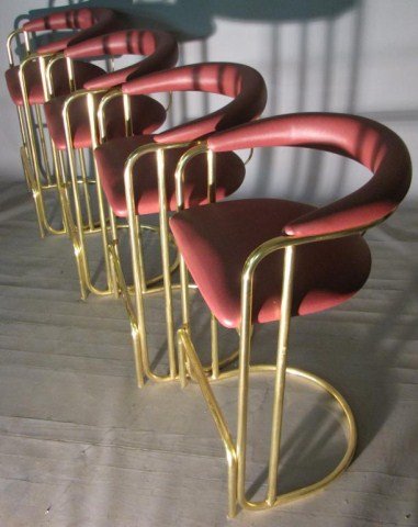 SET OF FOUR MODERN MAUVE BAR STOOLS: Bright and clean metal (save for some light toning and oxidation) with soft, clean upholstered seats, 41"H X 22"W X 24"D, seat height 30". Angular and modern; bases are marked L & B products.
