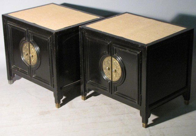 PAIR OF SPRINGER STYLE BLACK LACQUER CABINETS: Decisive and handsome, wonderfully embellished black cabinets with obvious Far Eastern influence. Woven textile tops, black interiors, 20" X 25"W X 24"H. Ideal for nightstands or matching end tables.