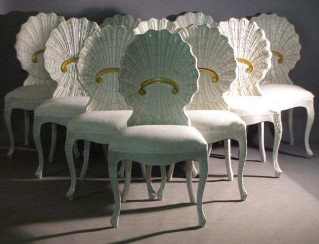 10-SHELL BACK D.R. CHAIRS IN MANNER OF SERGE ROCHE: Attractively carved legs and feet. The backrests are the truly striking motif for this set of ten matched dining chairs, 20"W X 23"D X 39"H, seat height 19". Very light indications of wear, though the