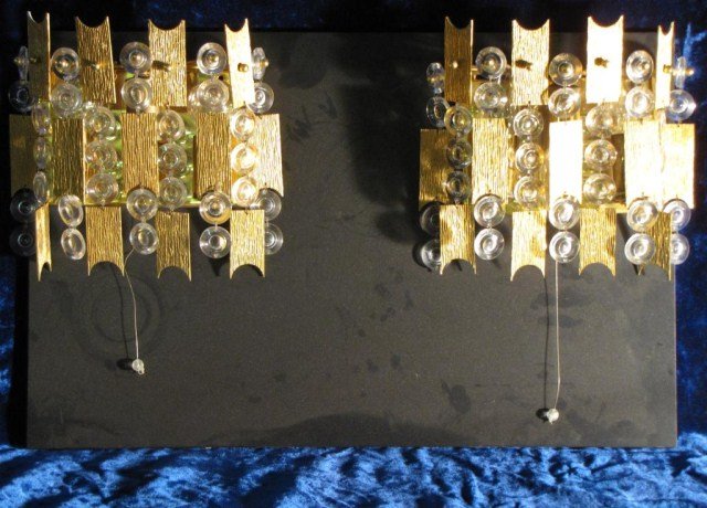 PAIR OF MODERN ITALIAN BRASS SCONCES: Very unusual pair of electrified light fixtures mounted to a presentation board, board is approximately 14" X 22". Light wear, otherwise quite presentable, 4"D X 8" X 9".