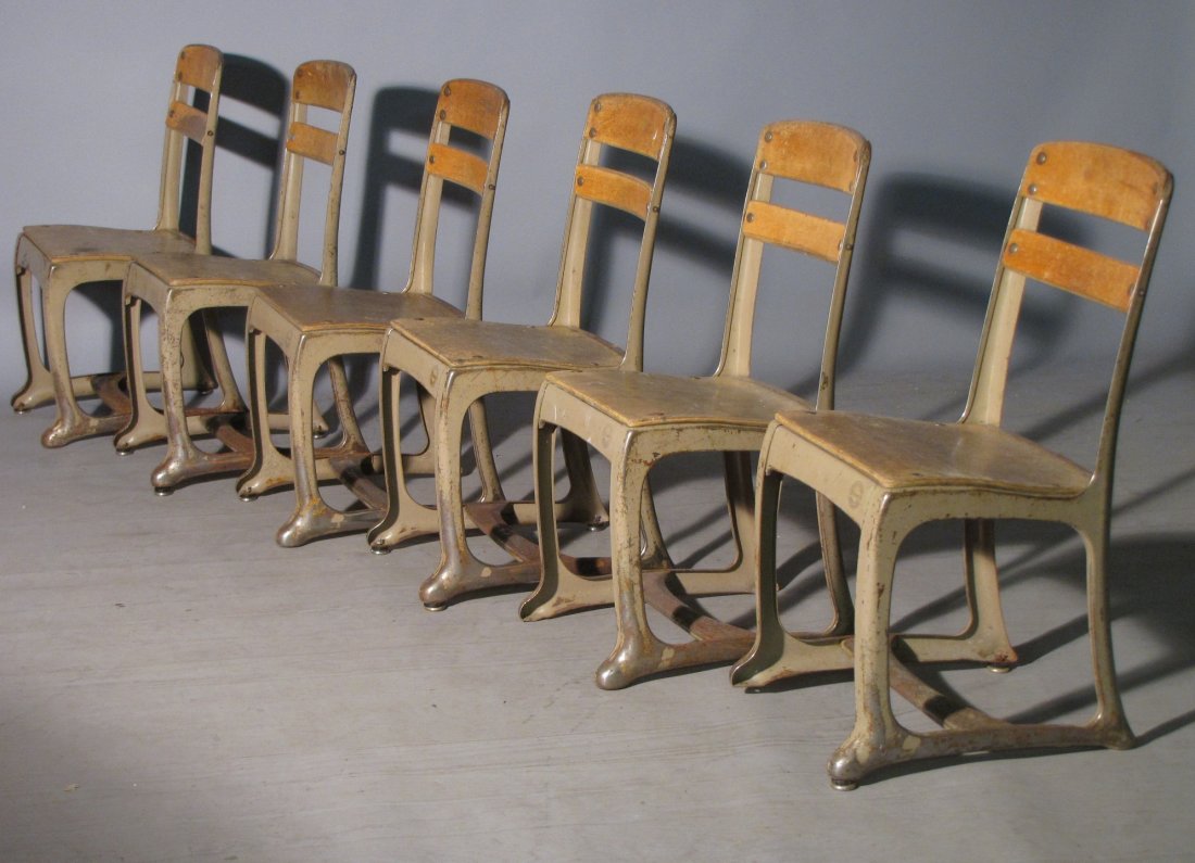 SIX MODERNIST SCHOOLHOUSE INDUSTRIAL CHAIRS: They look like Heywood Wakefield, but they're marked "Envoy" from the American Seating Company in Grand Rapids, Michigan. Stickers still cling tenaciously underneath that read "STEELE" from the Denver
