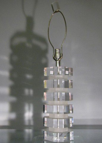 "STACKED" ACRYLIC SKYSCRAPER LAMP: Six tiers create the obvious metaphor for architecture of this distinctly stylish and striking light fixture, 6" X 7" X 31". All acrylic, bright, clean and ready for immediate installation.