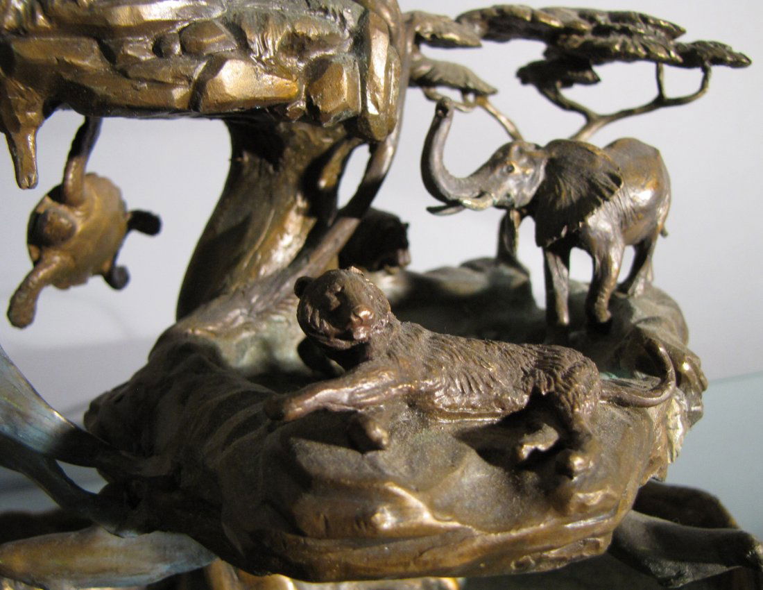 FIGURAL BRONZE SCULPTURE ANIMALS: Wild beast fountain. A curious and interesting variety of wild animals integrated through this 'running pool' fountain...there's no waterfall. Light signs of wear; but quite sound and presentable. Cas