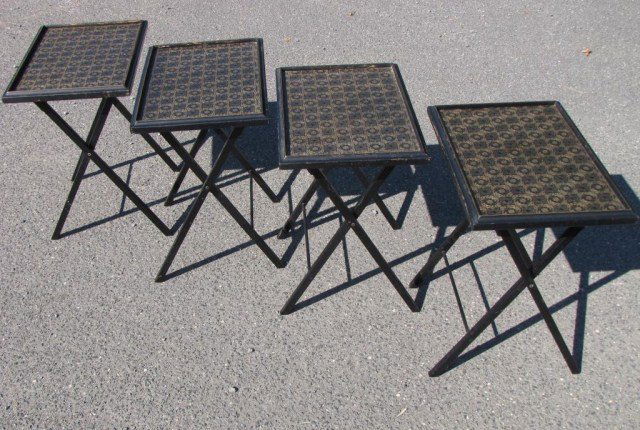 VINTAGE MODERN ASIAN FOUR TABLE ARTEX SET: Four matching collapsible tables, complete with original carrier & manufacturer labels adhered underneath. Attractive & elegant faux gold gilt, stamped leather tops & black lacquer frames. Discernible