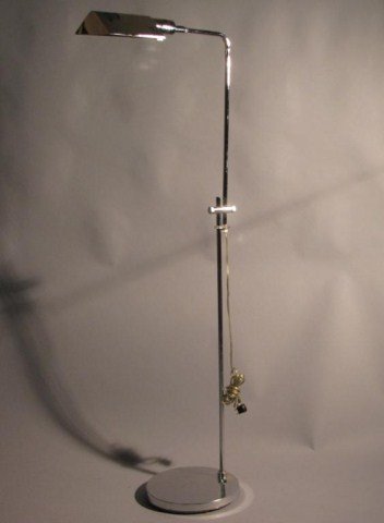 MODERN ADJUSTABLE CHROME LAMP: OMI: Marked on the shaft. Light signs of wear; otherwise, a presentable Vintage piece of Modernist lighting. About 17" wide; 49"high.