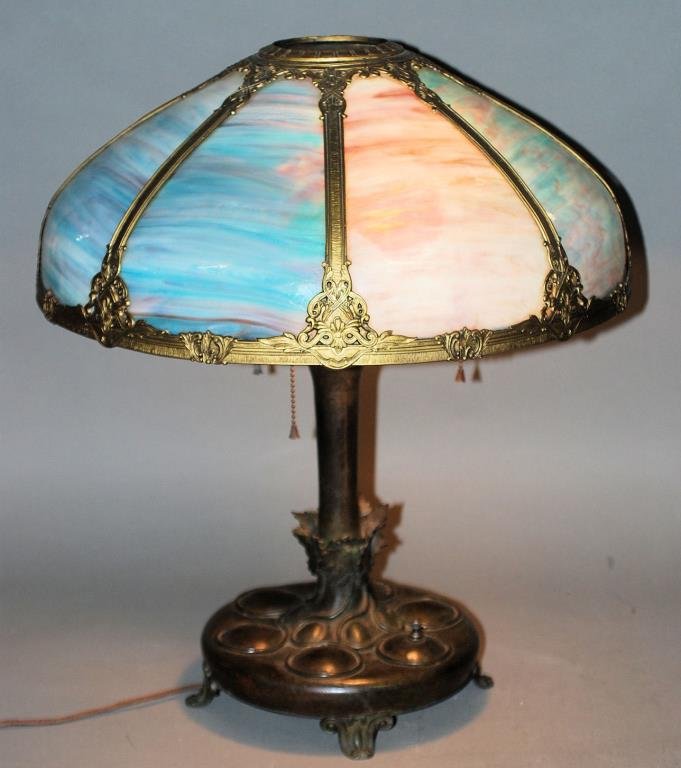 Vintage Slag Glass Panel Table Lamp: Vintage Slag Glass Panel Table Lamp. Patinated metal base with Blue slag glass shade. 23"H X 19"Diameter. In good condition.