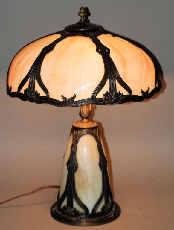 Vintage Slag Glass Panel Table Lamp: Vintage Slag Glass Panel Art Nouveau Style Table Lamp. Patinated metal base with slag glass shade. 23"H X 16"Diameter. In good condition.