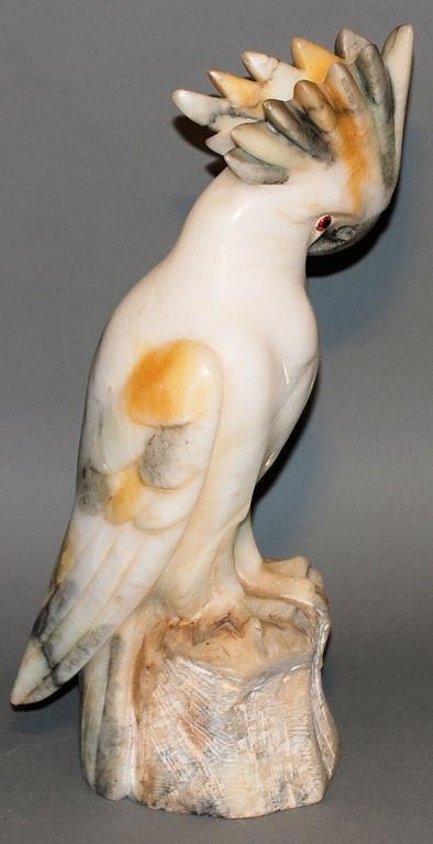 Marble Sculpture of a Cockatoo: Marble Sculpture of a Cockatoo. Multi-colored marble statue with glass eyes. 17 1/2"H X 11"W X 6"D. In good condition.