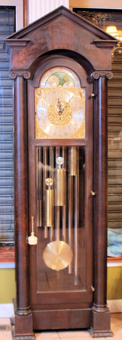 Herschede 9 Tube Grandfather Clock: Herschede 9 Tube Grandfather Clock. Mahogany case with 9 tubes and pendulum. 86"H X 29"W X 17 1/2"D. In good condition.