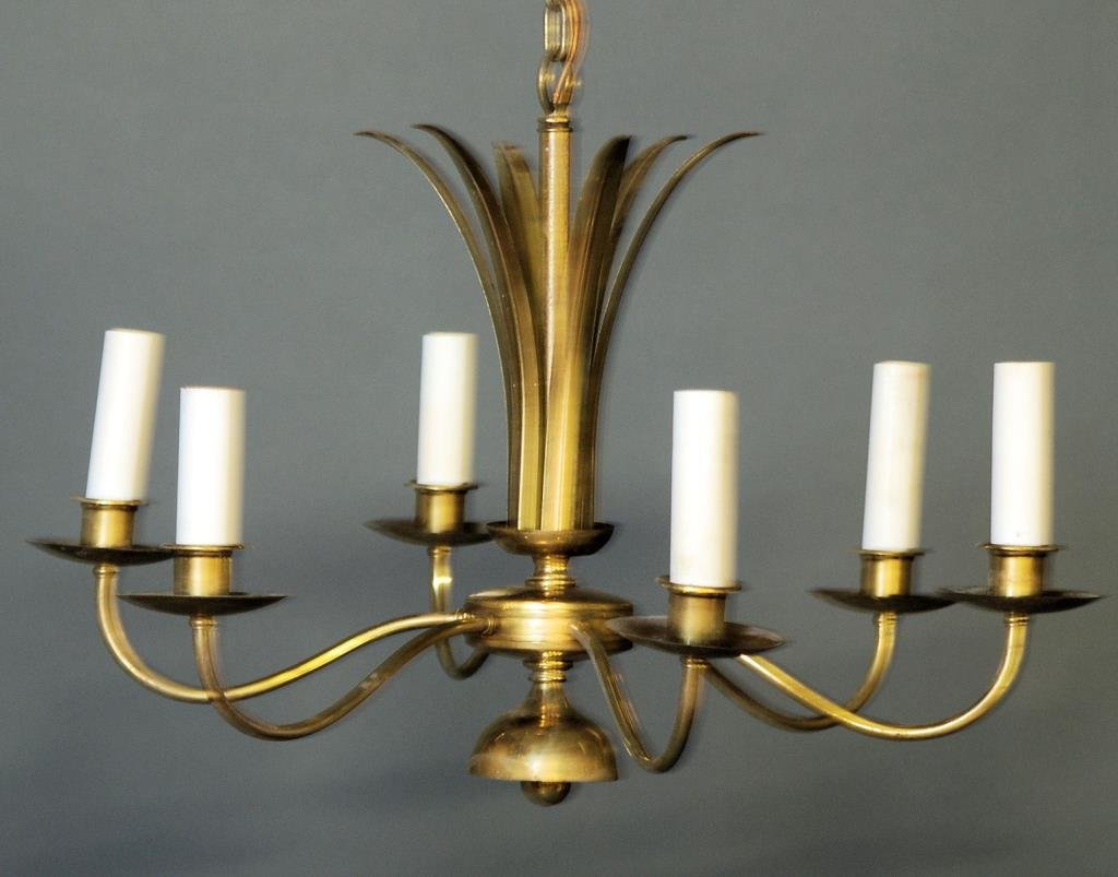Tommi Parzinger Style Chandelier: Tommi Parzinger Style Chandelier. 6 Arms with brass frame. 18"H X 26" Diameter. In good condition.