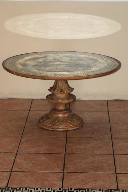 Venetian Style Coffee Table: Venetian Style Coffee Table. Round Asian modern reverse paint decorated mirrored top on a carved wood base. 18'H X 32"Diameter. In good condition.