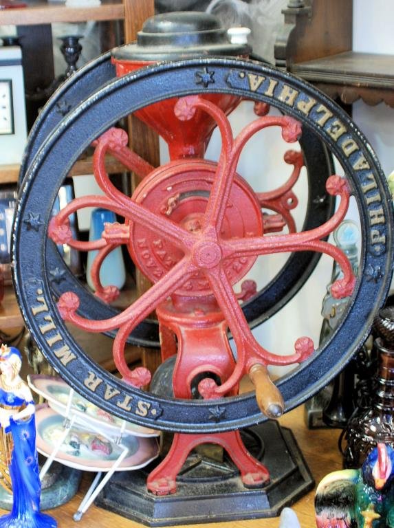 Antique Cast Iron Coffee Grinder: Antique American Star Mill Coffee Grinder. Iron with paint decoration.