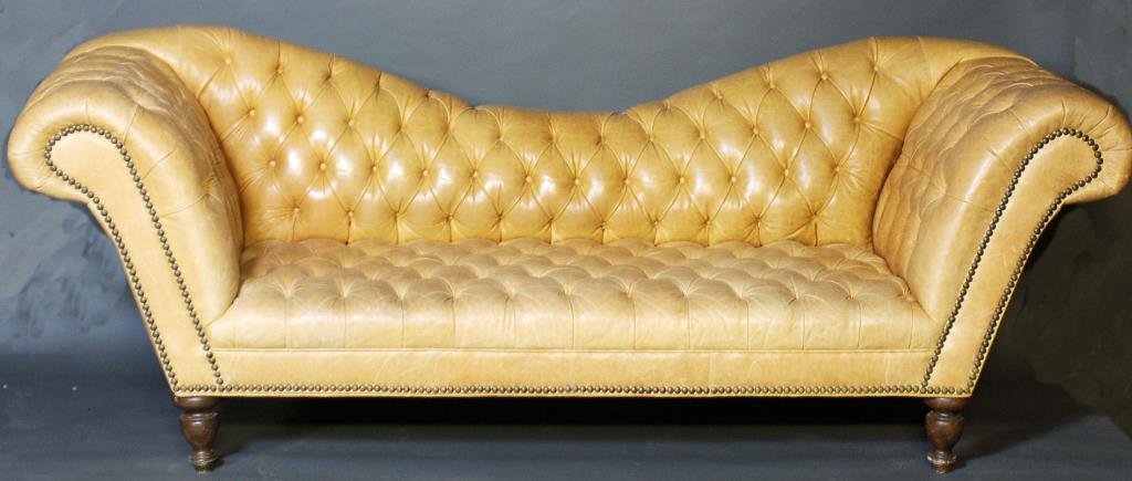 Old Hickory Tannery Chesterfield Sofa: Old Hickory Tannery Chesterfield Sofa. Tan leather tufted custom sofa, number 7901-03, still in production. Original retail cost was $4800. Natural wear to the leather. 36"H X 95"W X 32"D. In good con