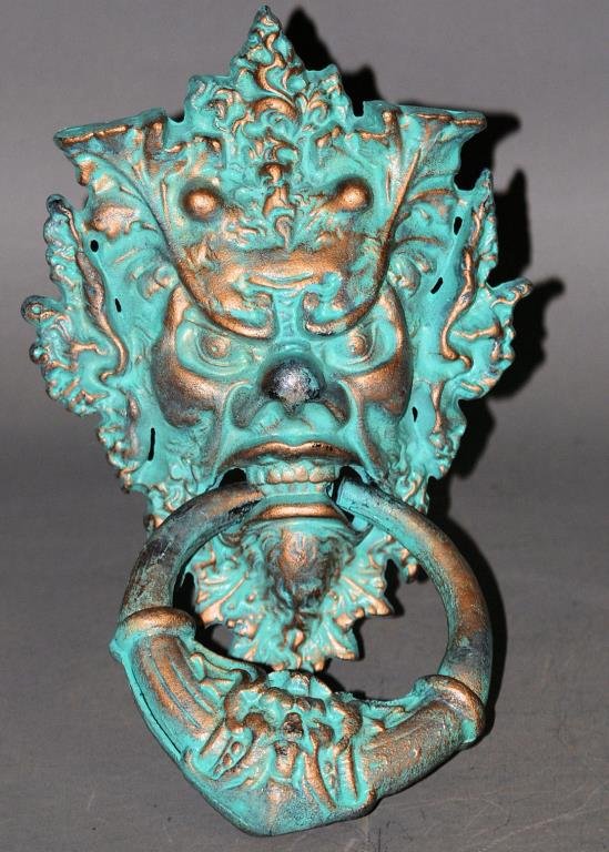 Victorian Style Door Knocker: Victorian Style Door Knocker. Patinated metal. 15"H X 8"W X 3"D. In good condition.