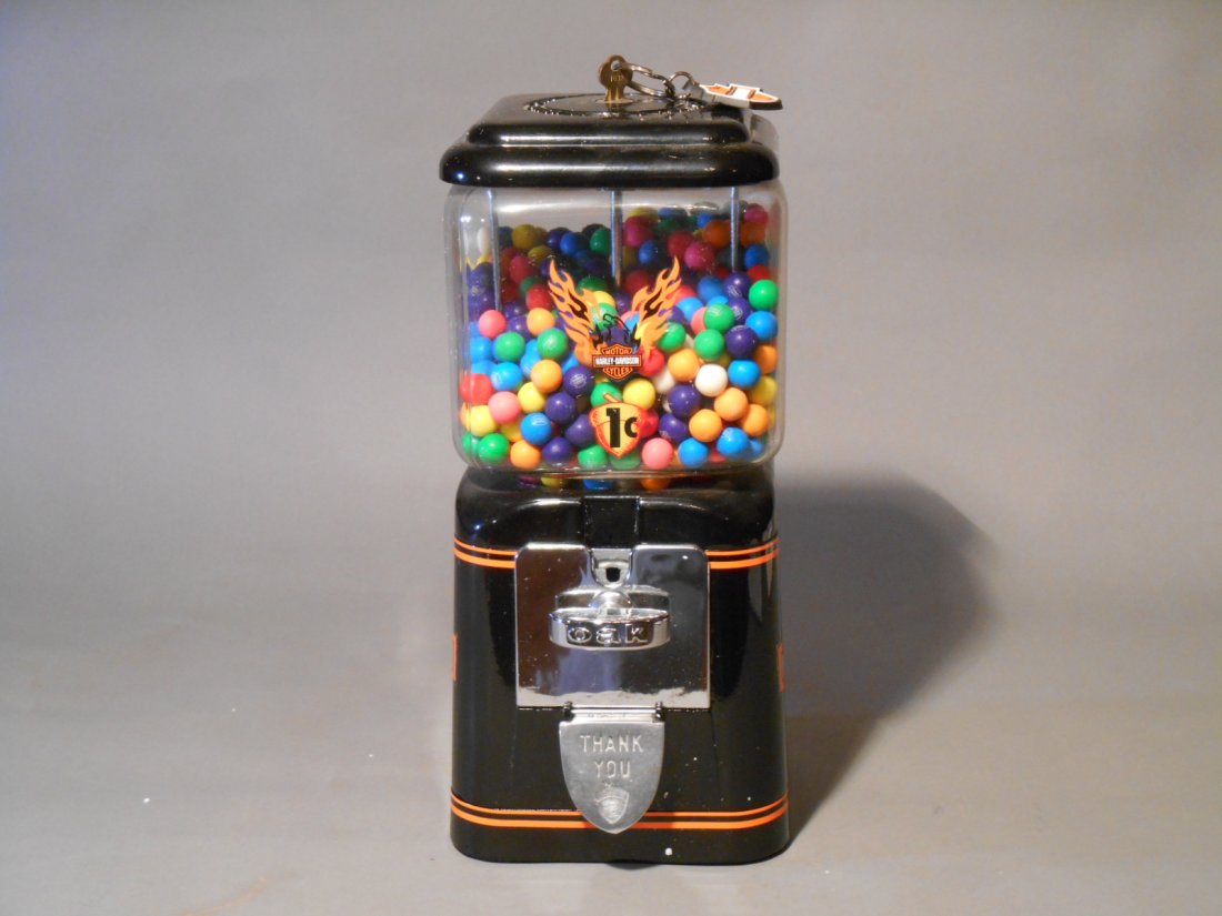 Harley Davidson Gum Machine: Vintage 1950’s-1960’s Oak Mfg. Co. Acorn model Harley Davidson themed 14” x 5 ¾” x 5 ¼” one cent gumball machine with key.