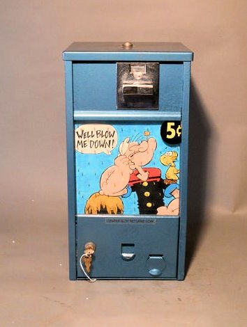 Popeye Gumball Machine: Vintage 1950’s Metalsmiths Popeye “Well Blow Me Down” 18” x 9 ¼” x 9 ¼” five cent gumball machine with key.